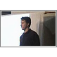 Replica symmetry breaking in the `small world' spin glass icon